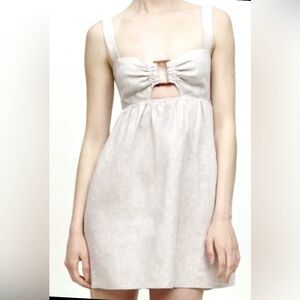 Reformation Noel Babydoll Mini dress 100% linen in light beige color Size 8
